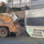 Caçamba de Entulho e Caminhão na Vila Carrão
